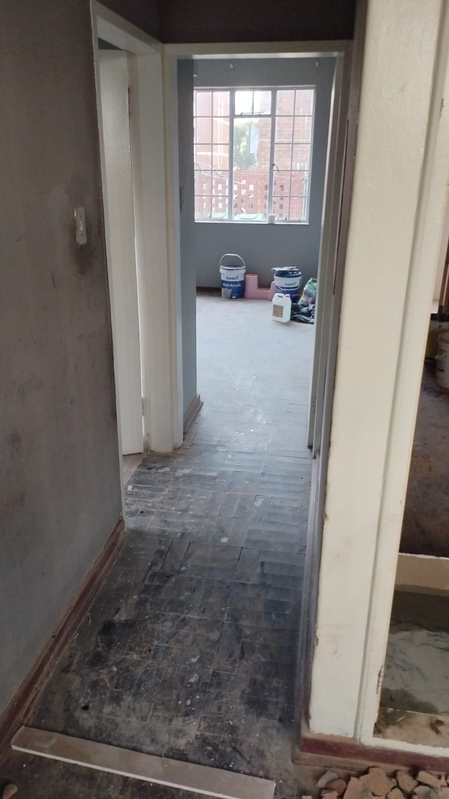 Dilapidated passageway before renovation
