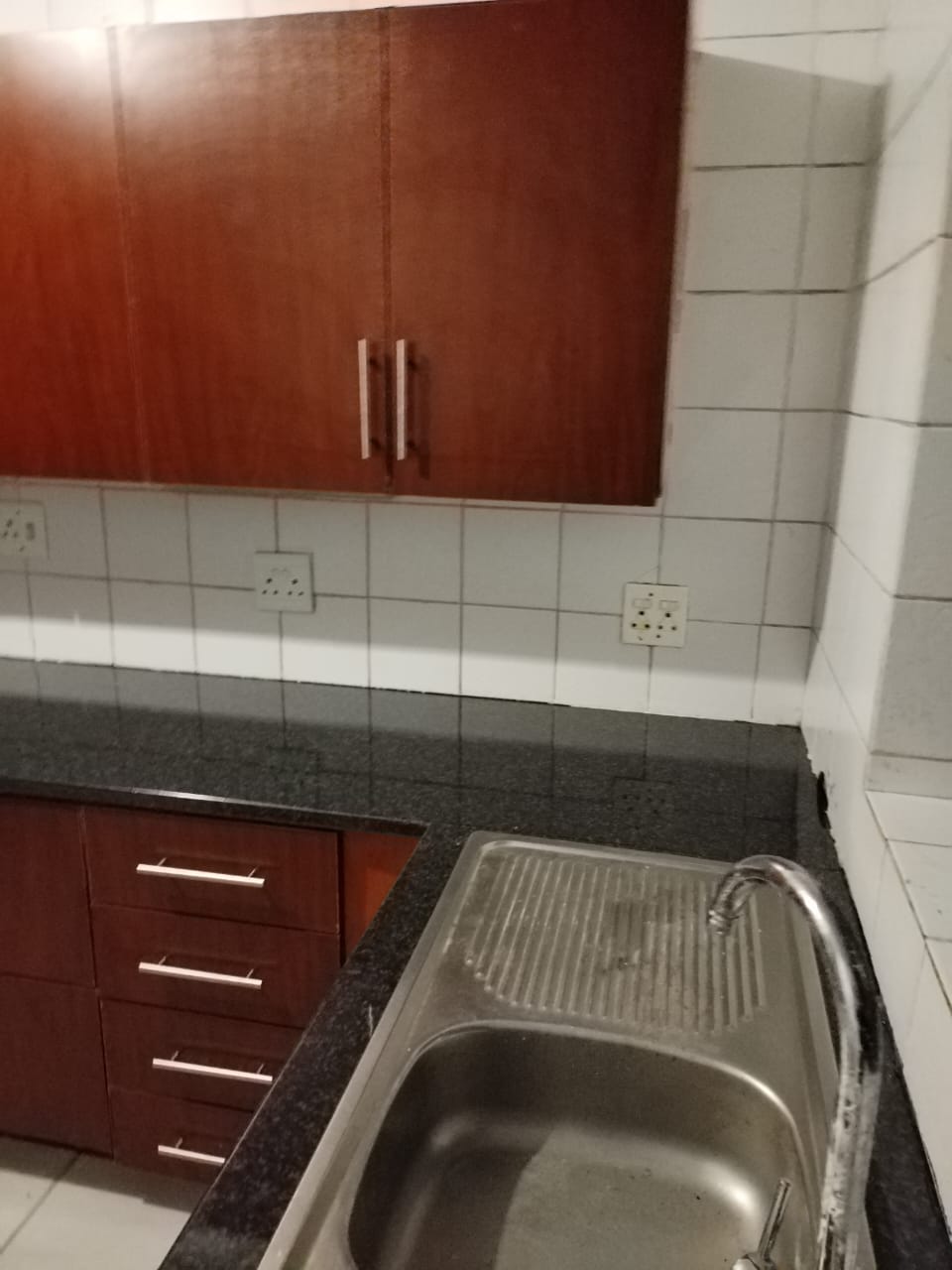 Kitchen with timber cabinets and granite top