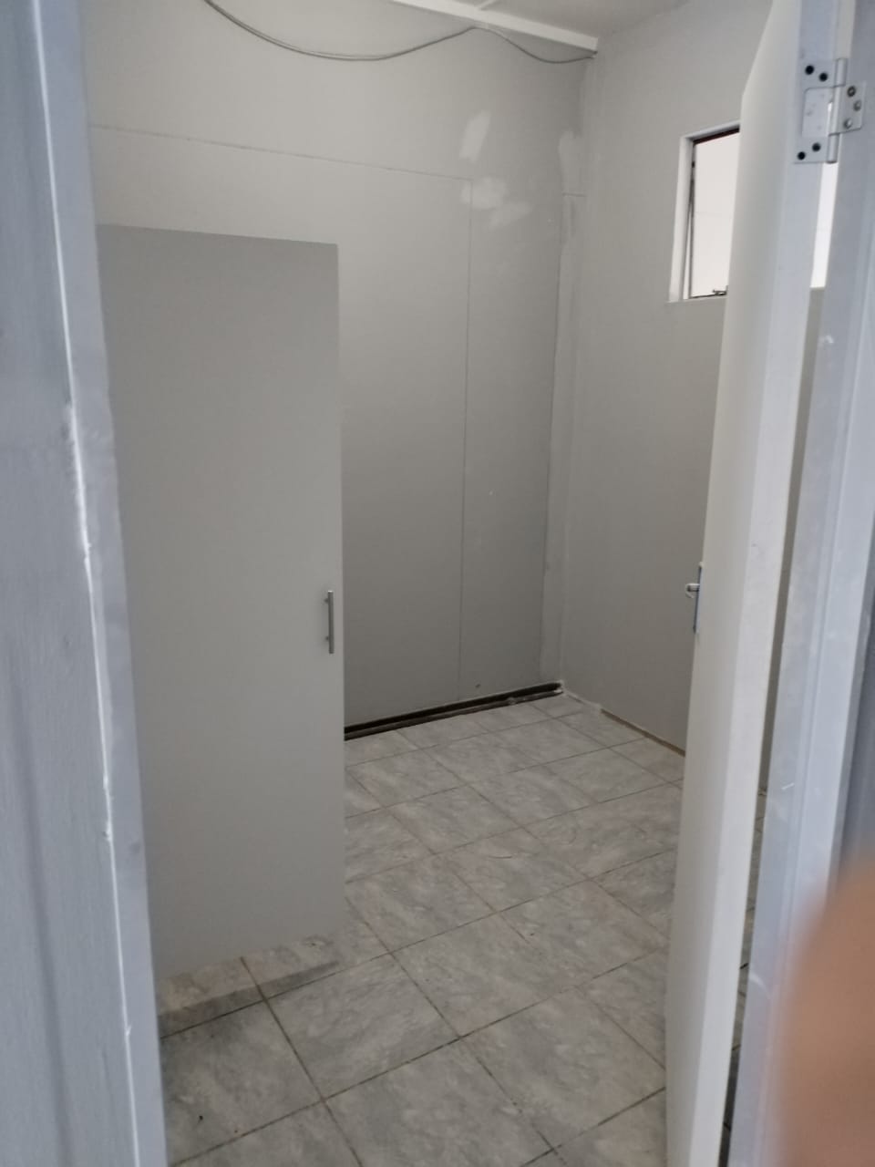 Renovated bathroom — tiled and painted