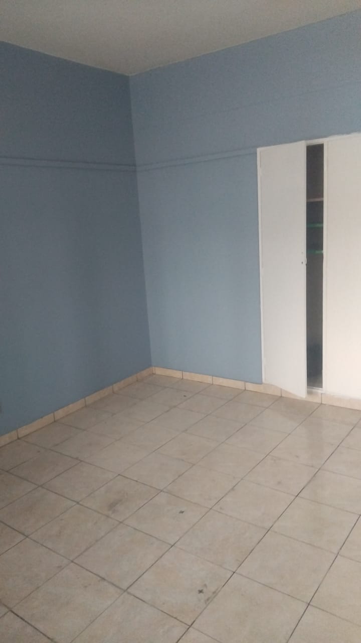 Vacant unit awaiting renovation — bedroom